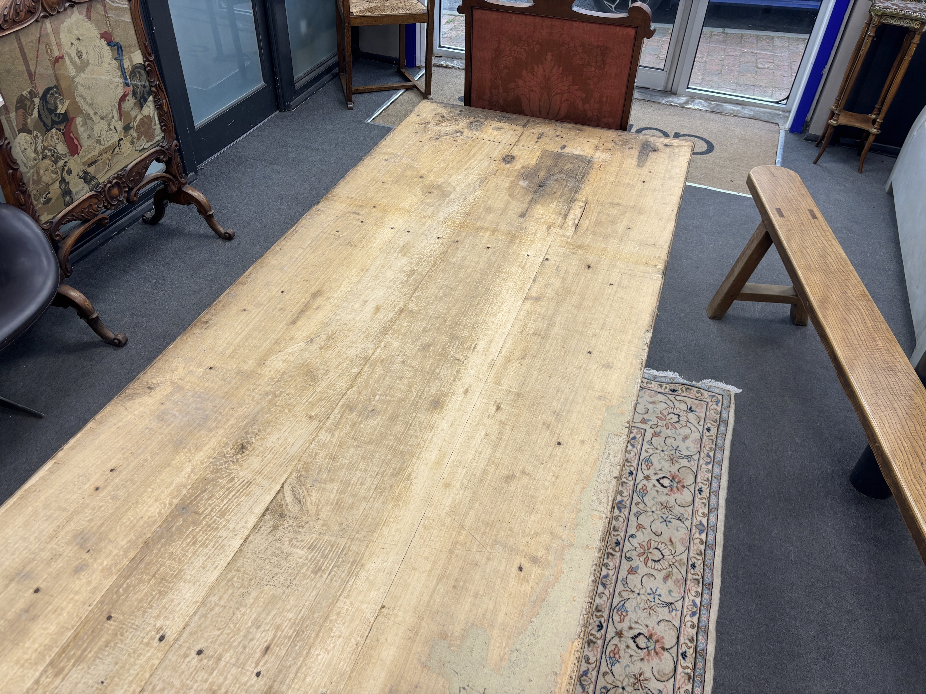 A 19th century French rectangular oak and fruitwood two drawer kitchen table, width 281cm, depth 95cm, height 77cm